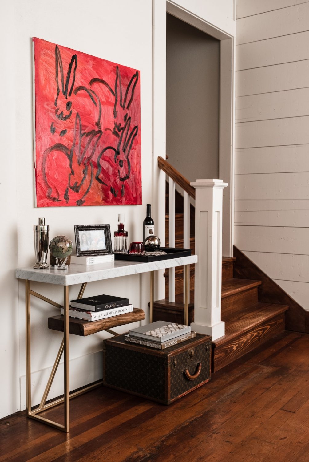 X Console Table decorated in an entryway